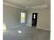 Spacious bedroom with large window and high ceilings at 8724 Se 157Th Pl, Summerfield, FL 34491