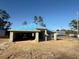 New construction home with block exterior and blue roofing underlayment at 8797 Se 161St Pl, Summerfield, FL 34491