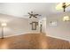 Large bedroom with hardwood floors and ceiling fan at 9176 Sw 93Rd Cir, Ocala, FL 34481