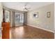 Well-lit bedroom with large window and wood-look floors at 9176 Sw 93Rd Cir, Ocala, FL 34481