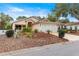 Single-story house with a two-car garage and a landscaped front yard at 9176 Sw 93Rd Cir, Ocala, FL 34481