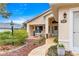 Inviting front porch with sitting area and decorative landscaping at 9176 Sw 93Rd Cir, Ocala, FL 34481