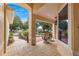 Relaxing covered porch with seating area and a view of the street at 9176 Sw 93Rd Cir, Ocala, FL 34481