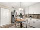 Kitchen breakfast nook with modern light fixture at 9176 Sw 93Rd Cir, Ocala, FL 34481