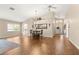 Living room with hardwood floors and access to other rooms at 9176 Sw 93Rd Cir, Ocala, FL 34481