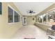 Bright sunroom with tile floors and view at 9176 Sw 93Rd Cir, Ocala, FL 34481