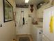 Convenient laundry room with washer, dryer, and storage at 9221 Sw 193Rd Cir, Dunnellon, FL 34432