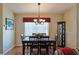 Formal dining room with wood table and chairs at 9688 Sw 45Th Ave, Ocala, FL 34476