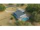 Aerial view of the home highlighting the screened pool and surrounding acreage at 9748 Sw 74Th Ave, Ocala, FL 34476