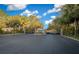 Gated entrance to Countryside Farms featuring decorative stone pillars and lush green landscaping at 9748 Sw 74Th Ave, Ocala, FL 34476