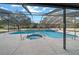 Relax in this beautiful pool and spa enclosed within a large screened enclosure at 9748 Sw 74Th Ave, Ocala, FL 34476