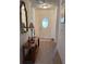 Entryway with hardwood floor and a console table at 9827 Sw 96Th St, Ocala, FL 34481