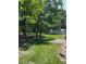 View of backyard with trees and a shed at 10245 Sw 105Th St, Ocala, FL 34481
