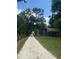 Gravel driveway leading to the house and barn at 10245 Sw 105Th St, Ocala, FL 34481