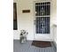 Inviting entryway with a decorative security door and a charming 'Welcome' sign at 10245 Sw 105Th St, Ocala, FL 34481