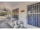 Welcoming porch with a swing, views, and 'welcome' sign at the front door at 10245 Sw 105Th St, Ocala, FL 34481
