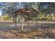 Small rustic wooden shelter in a field at 10245 Sw 105Th St, Ocala, FL 34481