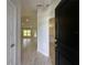 View from the front door showing tile flooring and an open-concept living space at 10927 Sw 41St Ave, Ocala, FL 34476