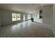 Spacious living room featuring tile flooring, lots of natural light and open floor plan at 10927 Sw 41St Ave, Ocala, FL 34476
