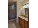 Bathroom with shower, toilet, vanity, and a large medicine cabinet at 10973 Sw 86Th Ct, Ocala, FL 34481