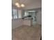 White kitchen with ample counter space and modern appliances at 10973 Sw 86Th Ct, Ocala, FL 34481