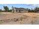 A view of the home's side exterior showing the lot, driveway and gray toned exterior at 11910 Sw 43Rd Street Road, Ocala, FL 34481