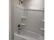 Bathroom featuring shower and bathtub combo at 13 Nw 45Th Loop, Ocala, FL 34475