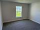Bedroom with large window that provides natural light at 13 Nw 45Th Loop, Ocala, FL 34475