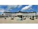 Expansive equestrian center with a manicured arena, water feature, and stadium seating at 13 Nw 45Th Loop, Ocala, FL 34475