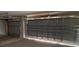 Unfinished two-car garage interior, prepped and ready to be used at 13 Nw 45Th Loop, Ocala, FL 34475