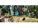 Picturesque view of a clear river surrounded by lush greenery and mature trees at 13 Nw 45Th Loop, Ocala, FL 34475