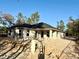 New construction home, block exterior walls, and a dark-colored roof at 15128 Se 93Rd Ave, Summerfield, FL 34491