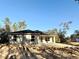 New construction home, block exterior walls, and a dark-colored roof at 15128 Se 93Rd Ave, Summerfield, FL 34491