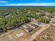 Aerial view of a new single-story home with surrounding land at 15413 Sw 65Th Terrace Rd, Ocala, FL 34473