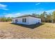 House exterior with side yard view at 15413 Sw 65Th Terrace Rd, Ocala, FL 34473