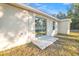 Private back patio accessible from sliding glass door at 16360 Se 88Th Ct, Summerfield, FL 34491