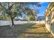 Large backyard with mature trees and privacy fence at 16360 Se 88Th Ct, Summerfield, FL 34491