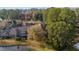 Aerial view of townhouses and pond at 1795 Se Clatter Bridge Rd # 1795, Ocala, FL 34471