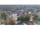 Aerial view of community near lake and pool at 1795 Se Clatter Bridge Rd # 1795, Ocala, FL 34471