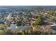 Aerial view of community with lake and fountain at 1795 Se Clatter Bridge Rd # 1795, Ocala, FL 34471