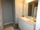 Clean bathroom with white vanity and granite countertop at 23092 Sw Nautilus Blvd, Dunnellon, FL 34431