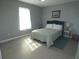 Bedroom with a full bed and nightstand at 23092 Sw Nautilus Blvd, Dunnellon, FL 34431