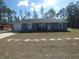 Charming single story home with gray siding at 23092 Sw Nautilus Blvd, Dunnellon, FL 34431