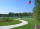 Curving path leads to a community sports field at 23092 Sw Nautilus Blvd, Dunnellon, FL 34431