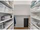 Spacious walk-in closet with ample shelving and storage at 2330 Nw 59Th Ave, Ocala, FL 34482