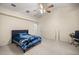 Spacious bedroom with a ceiling fan and access to a private bathroom at 2540 Se 35Th St, Ocala, FL 34471