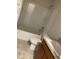 Clean bathroom with a tub, toilet and vanity with granite countertop at 3 Olive Way, Ocala, FL 34472