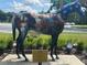 Painted Hero horse statue in a park at 3192 Ne 46Th Ave, Ocala, FL 34470