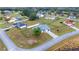 Aerial view of a single story home, fenced yard, and long driveway at 331 Oak Lane Dr, Ocala, FL 34472