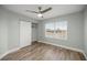 Light-filled bedroom featuring wood-style flooring and a window at 331 Oak Lane Dr, Ocala, FL 34472